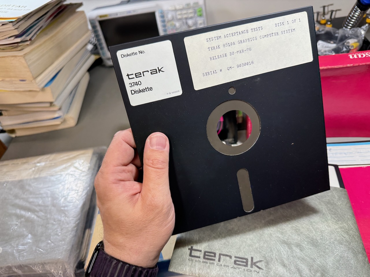 8-inch floppy disk out of the sleeve, held in my hand