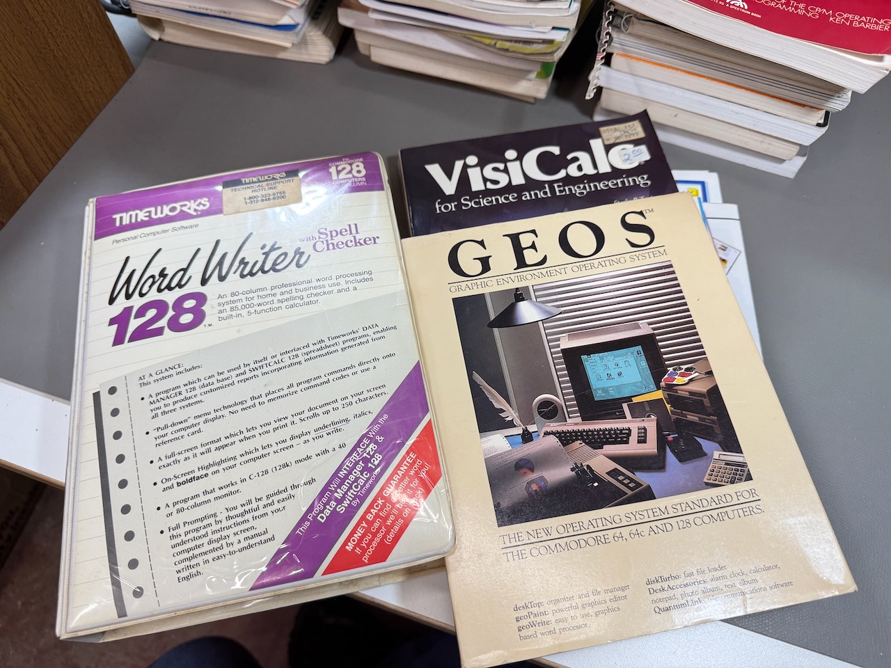 WordWriter 128 box and manual (no disk); GEOS C64 box and manual (no disk); a book on VisiCalc for Science and Engineering