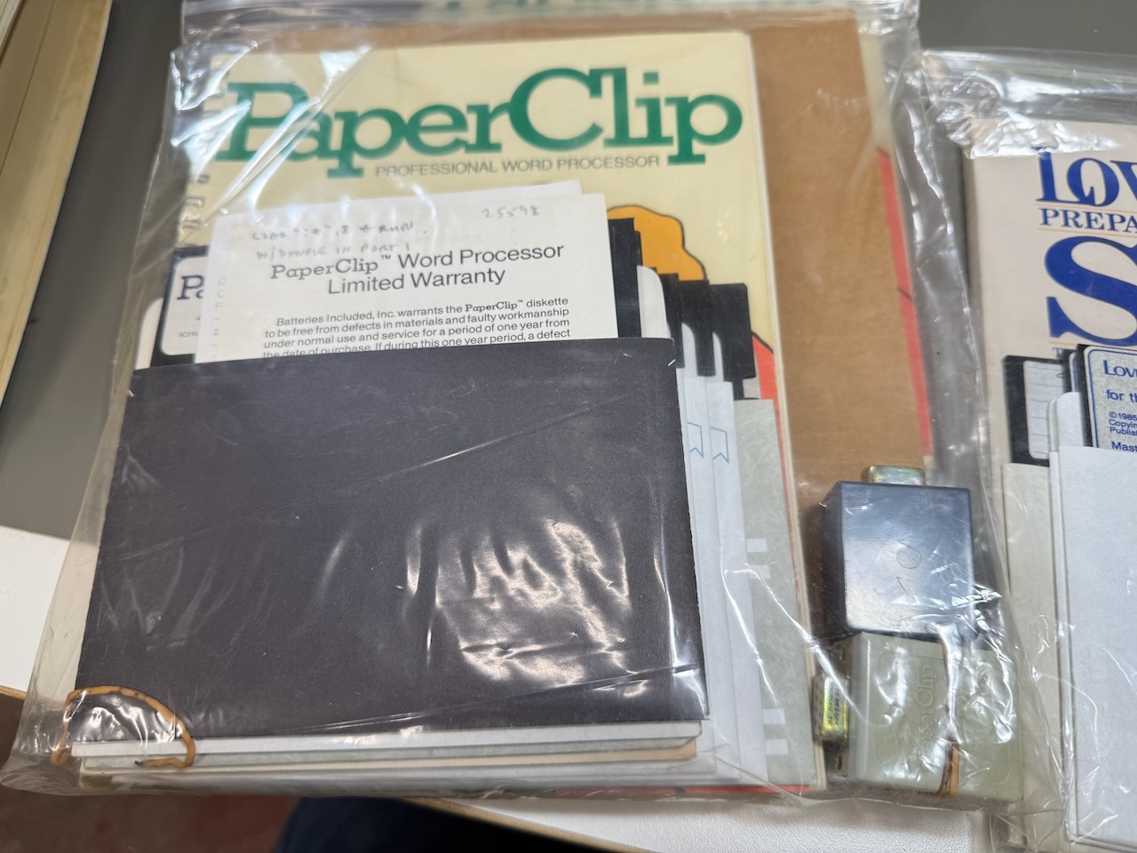 PaperClip word processor for the C64, with license dongles